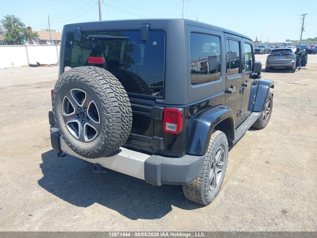 1C4BJWEG9EL289948 Jeep Wrangler Unlimited Sahara