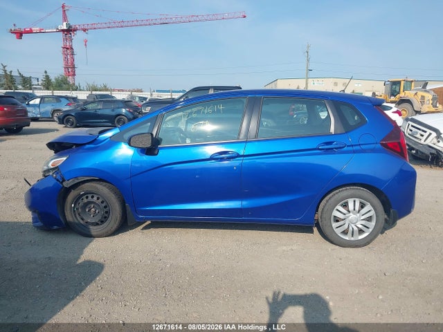 12671614 :رقم المزاد ، 3HGGK5H53GM104772 vin ، 2016 Honda Fit Lx مزاد بيع