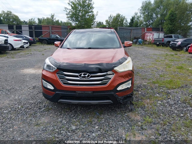 2014 Hyundai Santa Fe Sport 2.4 Luxury მანქანა იყიდება აუქციონზე, vin: 5XYZUDLB7EG124994, აუქციონის ნომერი: 12655799