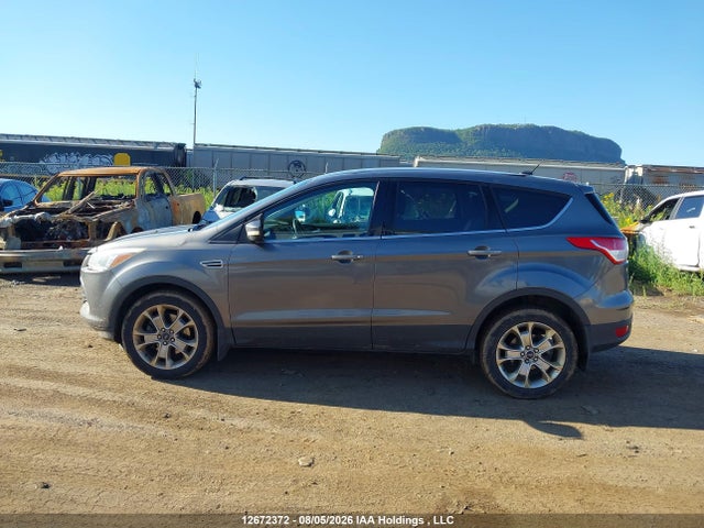 Продажа на аукционе авто 2013 Ford Escape Sel, vin: 1FMCU9H9XDUB48563, номер лота: 12672372