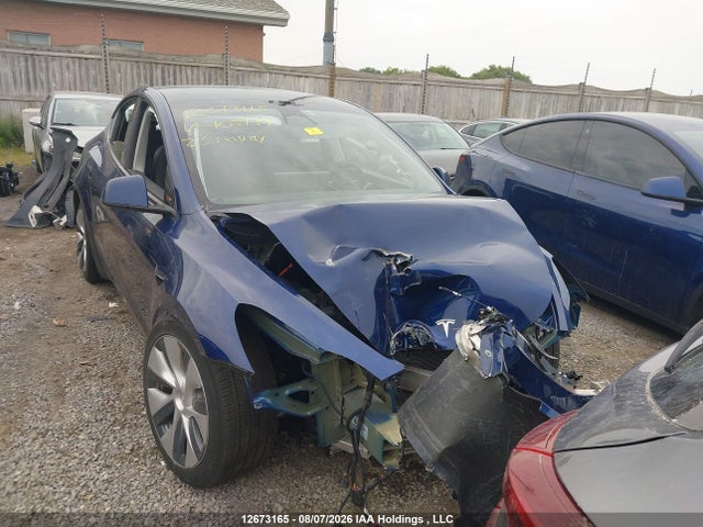 Tesla Model Y 2023 LRWYGDEE6PC105139 Image 12