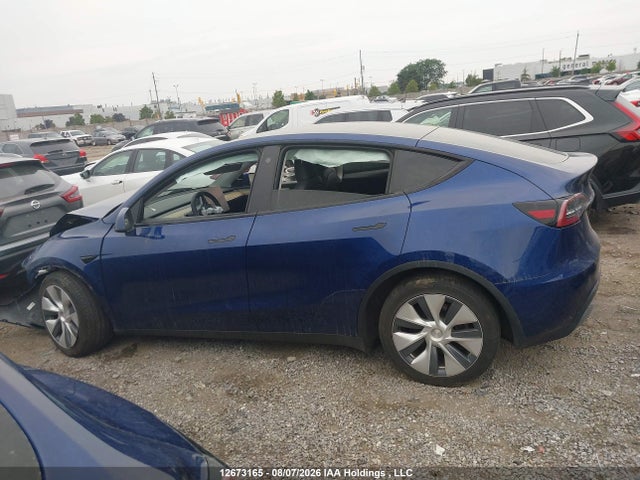 Tesla Model Y 2023 LRWYGDEE6PC105139 Image 14