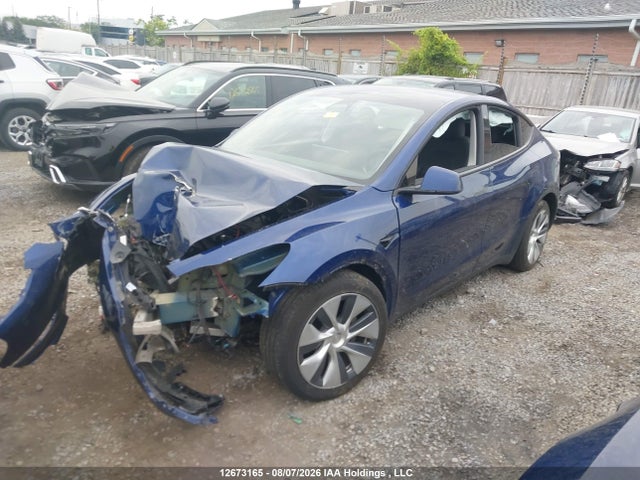 Tesla Model Y 2023 LRWYGDEE6PC105139 Image 2