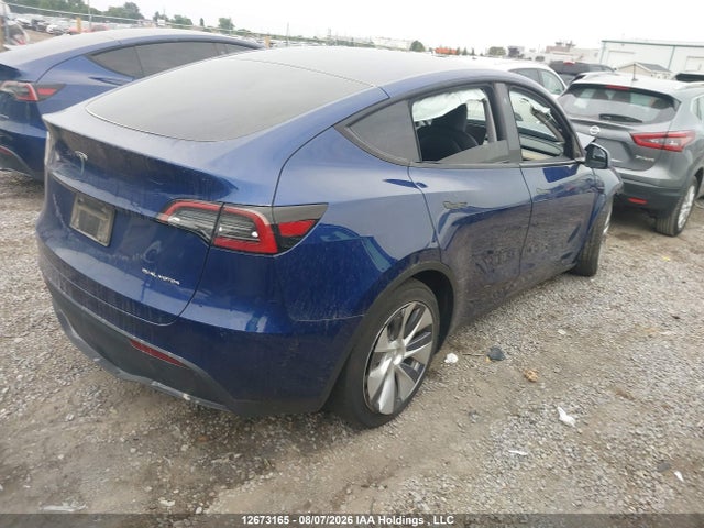 Tesla Model Y 2023 LRWYGDEE6PC105139 Image 4