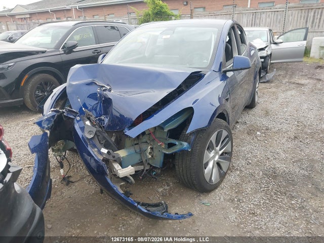 Tesla Model Y 2023 LRWYGDEE6PC105139 Image 6