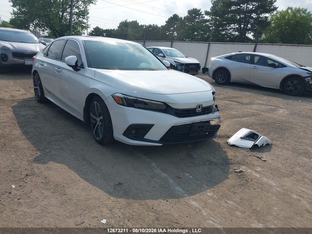 Продажа на аукционе авто 2022 Honda Civic Touring, vin: 2HGFE1F93NH003552, номер лота: 12673211