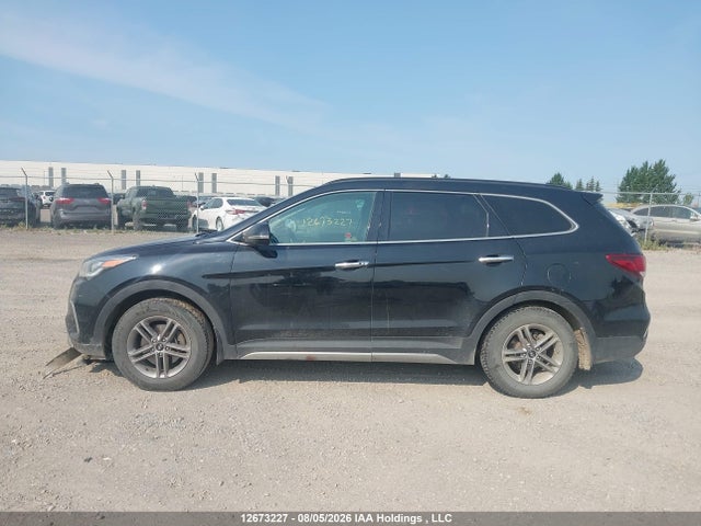 Auction sale of the 2018 Hyundai Santa Fe Se/limited, vin: KM8SNDHF9JU275902, lot number: 12673227