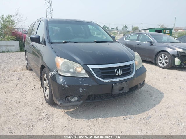 12642276 :رقم المزاد ، 5FNRL3H86AB505604 vin ، 2010 Honda Odyssey Touring مزاد بيع