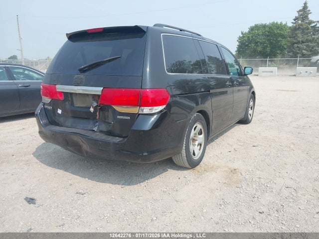 12642276 :رقم المزاد ، 5FNRL3H86AB505604 vin ، 2010 Honda Odyssey Touring مزاد بيع