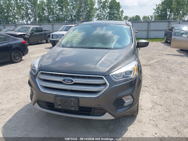 Продажа на аукционе авто 2018 Ford Escape, vin: 1FMCU9HD7JUC63816, номер лота: 12673333