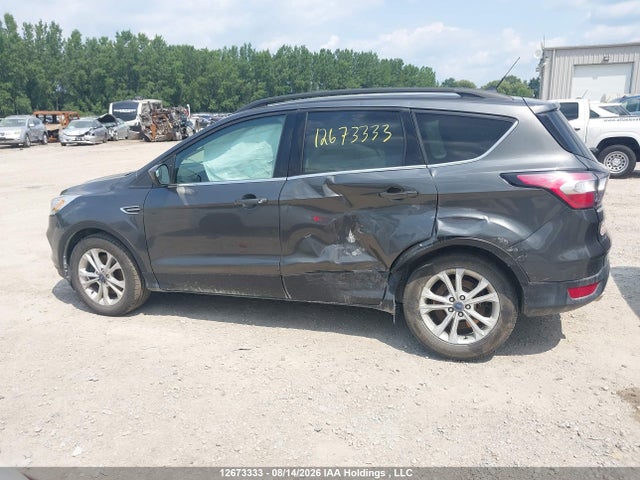 Продажа на аукционе авто 2018 Ford Escape, vin: 1FMCU9HD7JUC63816, номер лота: 12673333