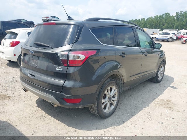 Продажа на аукционе авто 2018 Ford Escape, vin: 1FMCU9HD7JUC63816, номер лота: 12673333