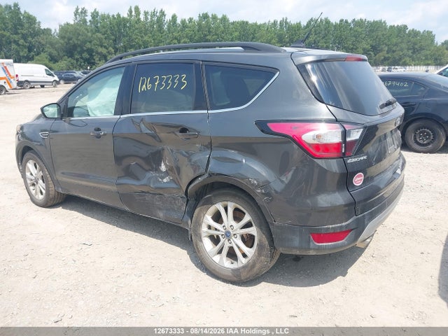 Продажа на аукционе авто 2018 Ford Escape, vin: 1FMCU9HD7JUC63816, номер лота: 12673333
