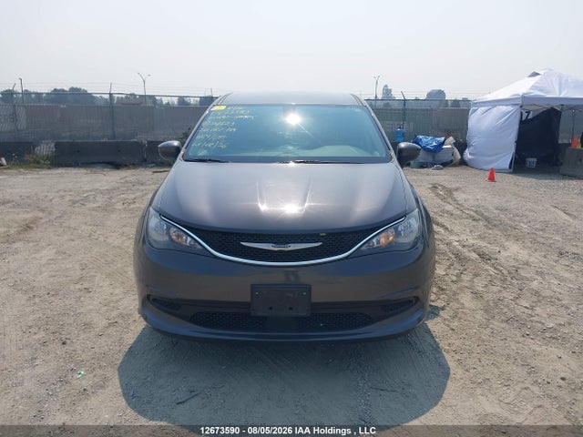 12673590 :رقم المزاد ، 2C4RC1ZG6MR554823 vin ، 2021 Chrysler Grand Caravan Sxt مزاد بيع