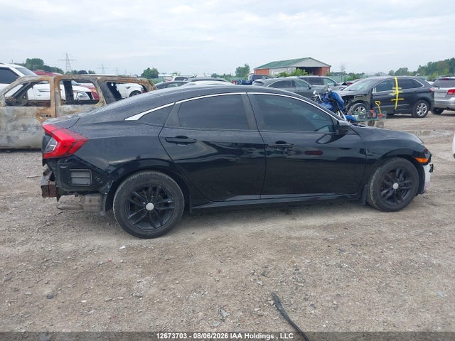 Auction sale of the 2017 Honda Civic Lx, vin: 2HGFC2E59HH009905, lot number: 12673703
