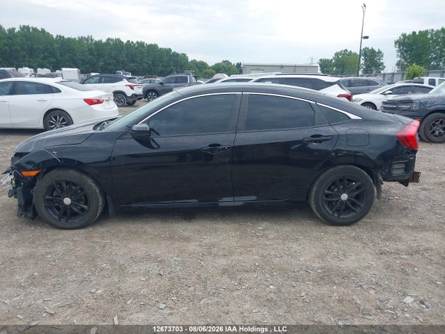 Auction sale of the 2017 Honda Civic Lx, vin: 2HGFC2E59HH009905, lot number: 12673703