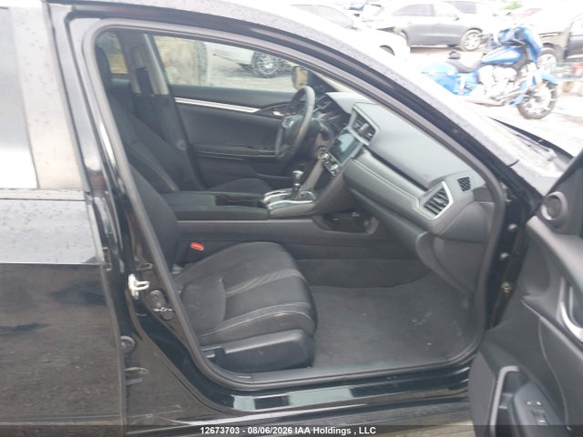 Auction sale of the 2017 Honda Civic Lx, vin: 2HGFC2E59HH009905, lot number: 12673703