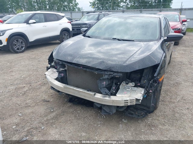 Auction sale of the 2017 Honda Civic Lx, vin: 2HGFC2E59HH009905, lot number: 12673703