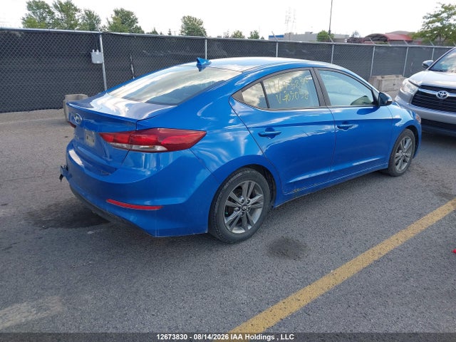 KMHD84LF6JU703058 Hyundai ELANTRA GL