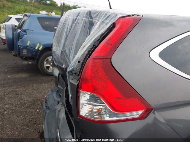 Продаж на аукціоні авто 2014 Honda Cr-v Touring, vin: 2HKRM4H96EH116402, номер лоту: 12674039