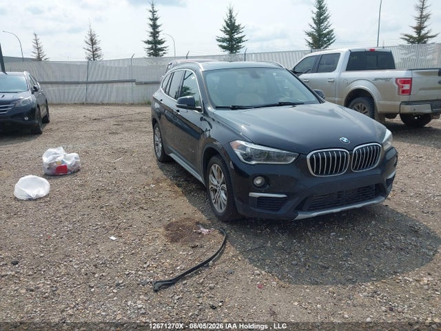 2018 WBXHT3C31J5L25815 main image