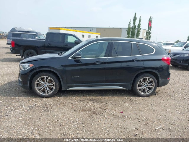 12671270 :رقم المزاد ، WBXHT3C31J5L25815 vin ، 2018 Bmw X1 Xdrive28i مزاد بيع