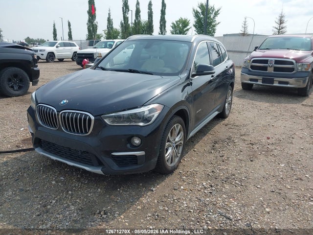 12671270 :رقم المزاد ، WBXHT3C31J5L25815 vin ، 2018 Bmw X1 Xdrive28i مزاد بيع