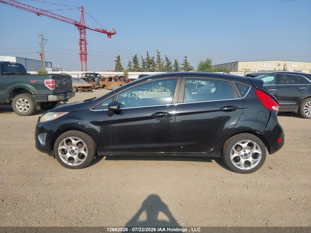 Продажа на аукционе авто 2011 Ford Fiesta Ses, vin: 3FADP4FJ6BM130133, номер лота: 12662026