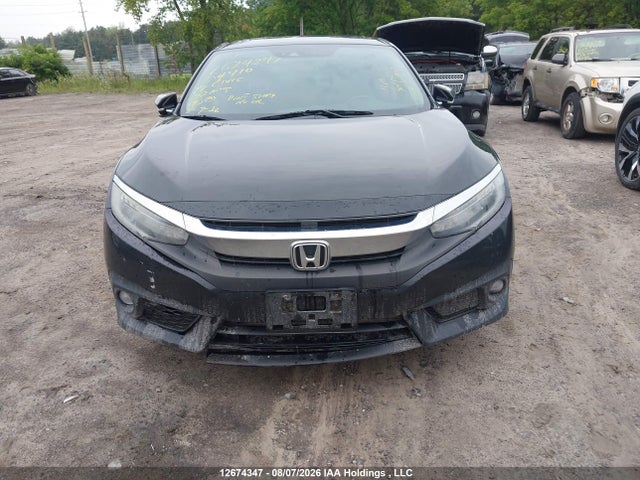 2017 Honda Civic Touring მანქანა იყიდება აუქციონზე, vin: 2HGFC1F93HH104410, აუქციონის ნომერი: 12674347