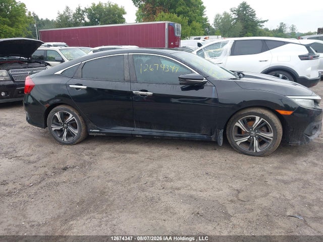 2017 Honda Civic Touring მანქანა იყიდება აუქციონზე, vin: 2HGFC1F93HH104410, აუქციონის ნომერი: 12674347