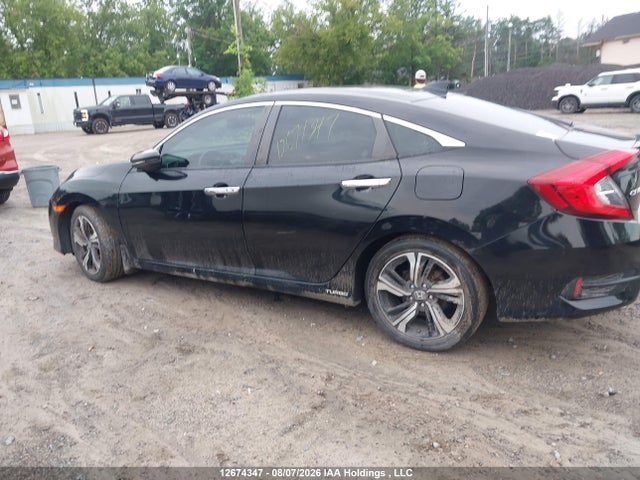 2017 Honda Civic Touring მანქანა იყიდება აუქციონზე, vin: 2HGFC1F93HH104410, აუქციონის ნომერი: 12674347