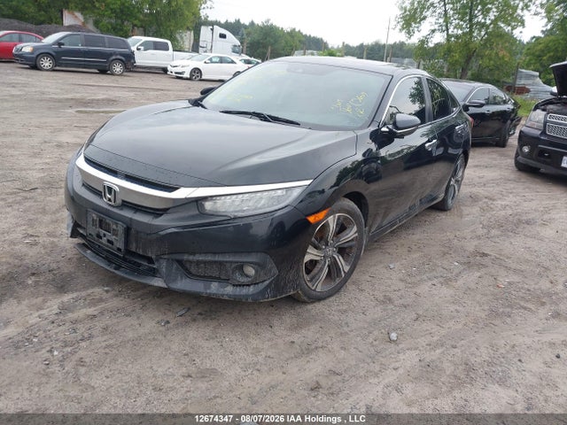 2017 Honda Civic Touring მანქანა იყიდება აუქციონზე, vin: 2HGFC1F93HH104410, აუქციონის ნომერი: 12674347