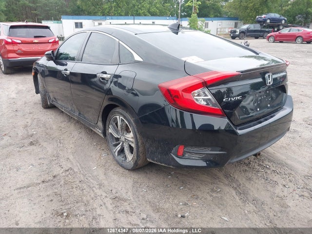 2017 Honda Civic Touring მანქანა იყიდება აუქციონზე, vin: 2HGFC1F93HH104410, აუქციონის ნომერი: 12674347