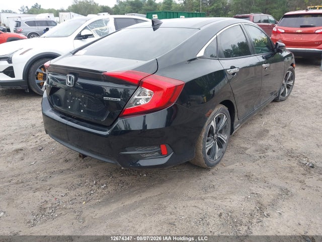 2017 Honda Civic Touring მანქანა იყიდება აუქციონზე, vin: 2HGFC1F93HH104410, აუქციონის ნომერი: 12674347