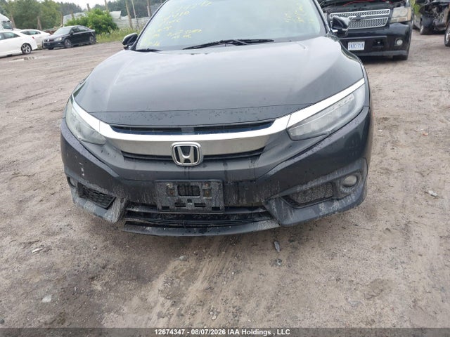 2017 Honda Civic Touring მანქანა იყიდება აუქციონზე, vin: 2HGFC1F93HH104410, აუქციონის ნომერი: 12674347