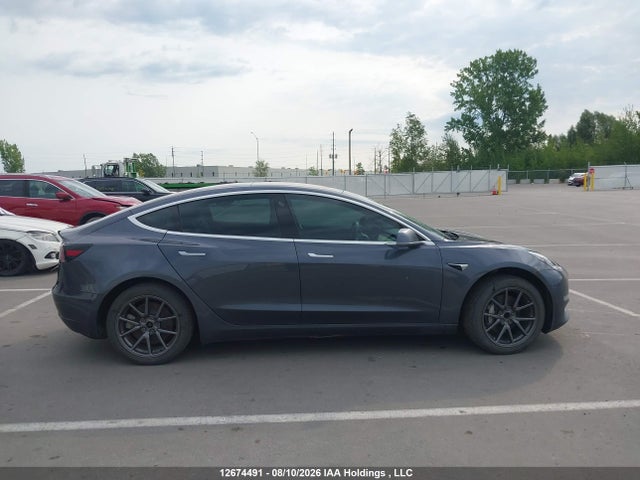 Auction sale of the 2018 Tesla Model 3, vin: 5YJ3E1EA5JF028823, lot number: 12674491