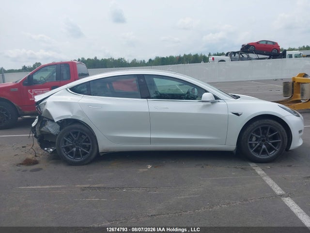 5YJ3E1EA6LF704084 Tesla MODEL 3