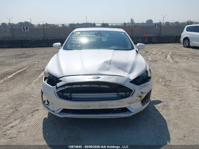 Auction sale of the 2019 Ford Fusion Hybrid Titanium, vin: 3FA6P0RU6KR191234, lot number: 12674845