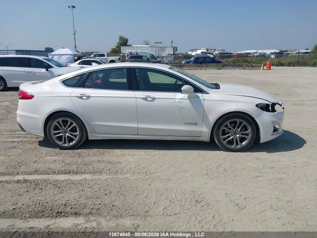Auction sale of the 2019 Ford Fusion Hybrid Titanium, vin: 3FA6P0RU6KR191234, lot number: 12674845