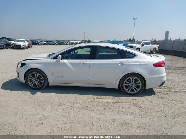 Auction sale of the 2019 Ford Fusion Hybrid Titanium, vin: 3FA6P0RU6KR191234, lot number: 12674845
