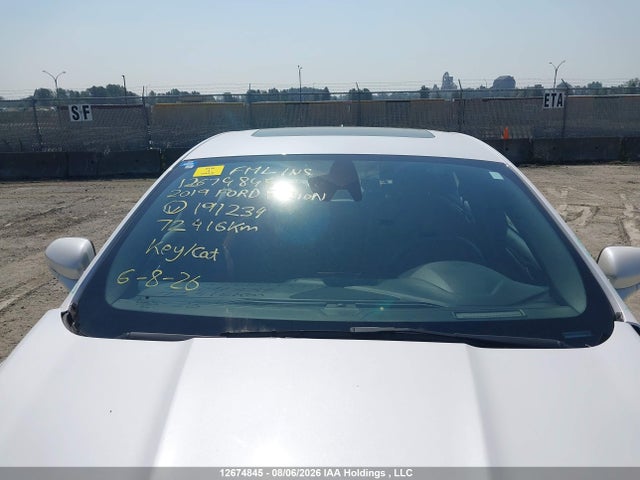 Auction sale of the 2019 Ford Fusion Hybrid Titanium, vin: 3FA6P0RU6KR191234, lot number: 12674845