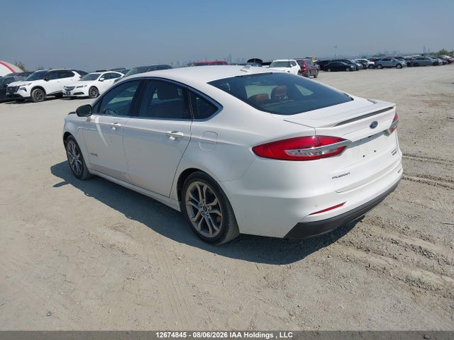 Auction sale of the 2019 Ford Fusion Hybrid Titanium, vin: 3FA6P0RU6KR191234, lot number: 12674845