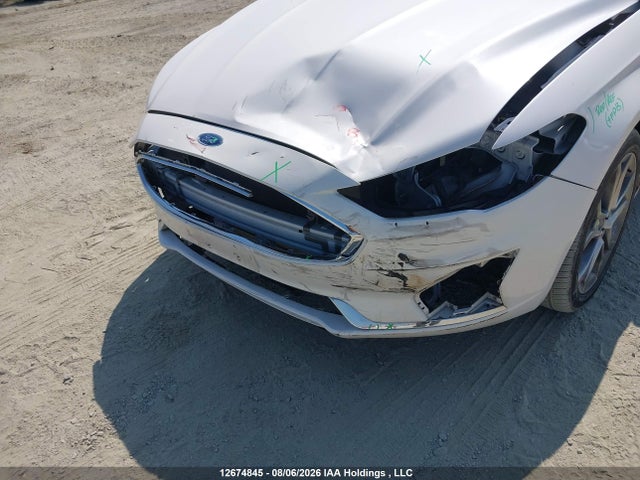 Auction sale of the 2019 Ford Fusion Hybrid Titanium, vin: 3FA6P0RU6KR191234, lot number: 12674845