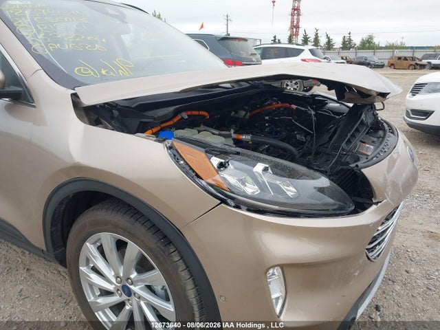 12673640 :رقم المزاد ، 1FMCU9DZ0MUB12161 vin ، 2021 Ford Escape Titanium Hybrid مزاد بيع