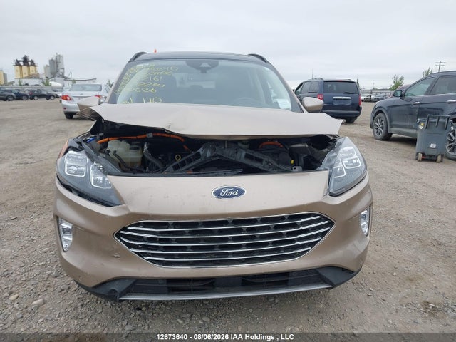 12673640 :رقم المزاد ، 1FMCU9DZ0MUB12161 vin ، 2021 Ford Escape Titanium Hybrid مزاد بيع