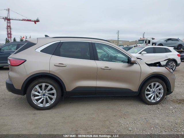 12673640 :رقم المزاد ، 1FMCU9DZ0MUB12161 vin ، 2021 Ford Escape Titanium Hybrid مزاد بيع