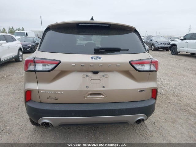 12673640 :رقم المزاد ، 1FMCU9DZ0MUB12161 vin ، 2021 Ford Escape Titanium Hybrid مزاد بيع