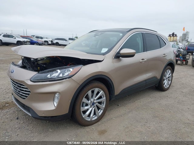 12673640 :رقم المزاد ، 1FMCU9DZ0MUB12161 vin ، 2021 Ford Escape Titanium Hybrid مزاد بيع