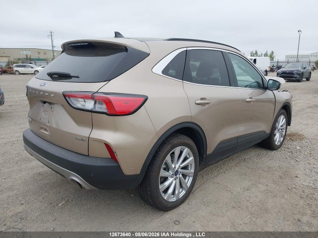 12673640 :رقم المزاد ، 1FMCU9DZ0MUB12161 vin ، 2021 Ford Escape Titanium Hybrid مزاد بيع