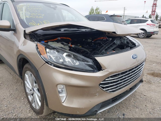 12673640 :رقم المزاد ، 1FMCU9DZ0MUB12161 vin ، 2021 Ford Escape Titanium Hybrid مزاد بيع